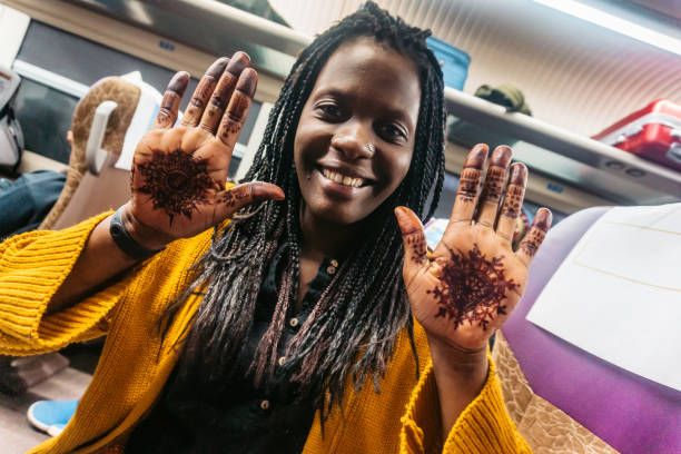 Woman with henna tattoos on hands
