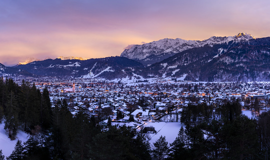 Obersdorf, Germany - August 12, 2022: Panorama of Obersdorf town and a ski jump in Bavarian Alpes, Germany.