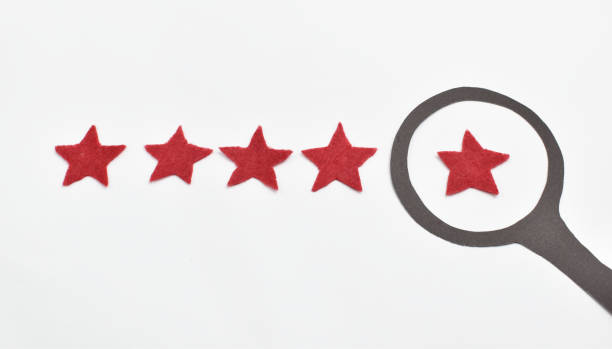 istock 5 Star Ranking Formed magnifying glass 1298987181