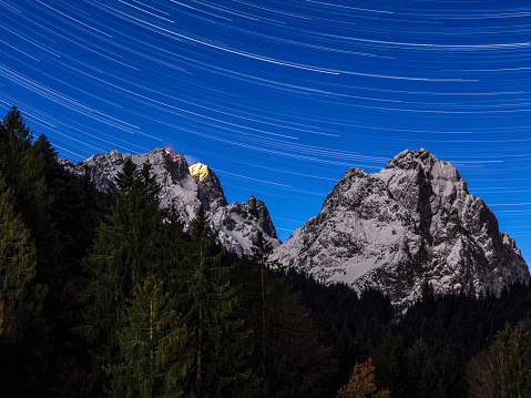 Zugspitze mountain under star lit skies (star trails)
