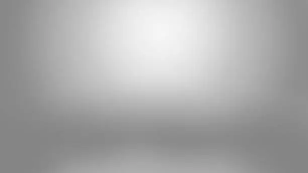 Silver platinum metal abstract defocused background, Silver colored metallic surface luminous blurred color background, Light gray and white spotlight empty blank backdrop with copy space