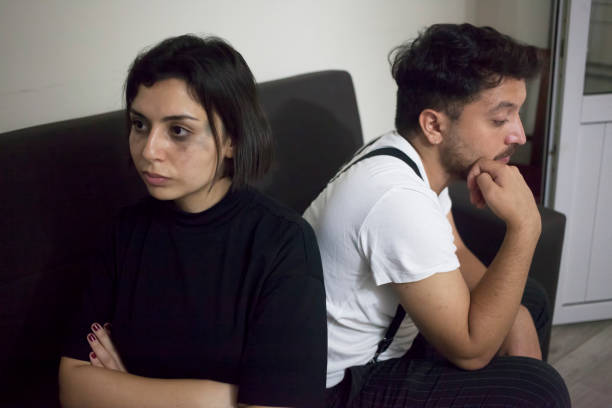 istock Unhappy young couple 1298989070