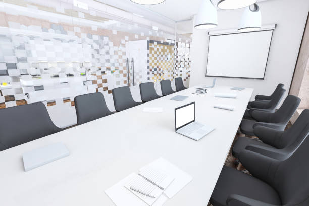 istock Modern conference room interior with projector screen on the wall for copy space 1298990442