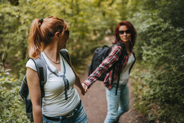 istock Tourist guide on the forest trail 1298991530