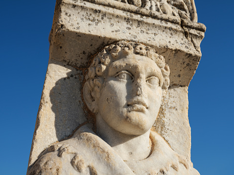 Virgin Mary. Close up. An ancient statue.