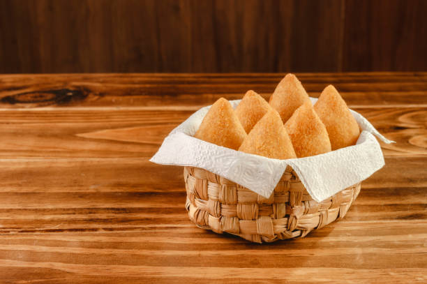 Brazilian snacks Deep fried croquette serving portion (coxinha de frango) - Close-up coxinha stock pictures, royalty-free photos & images