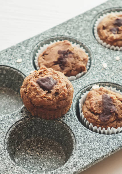 istock Carrot muffins with nuts and raisins. 1298996637