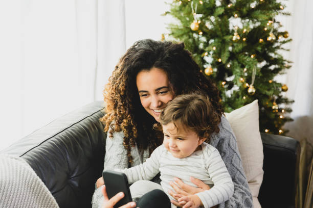 istock Happy mom taking selfie with young son 1298997558