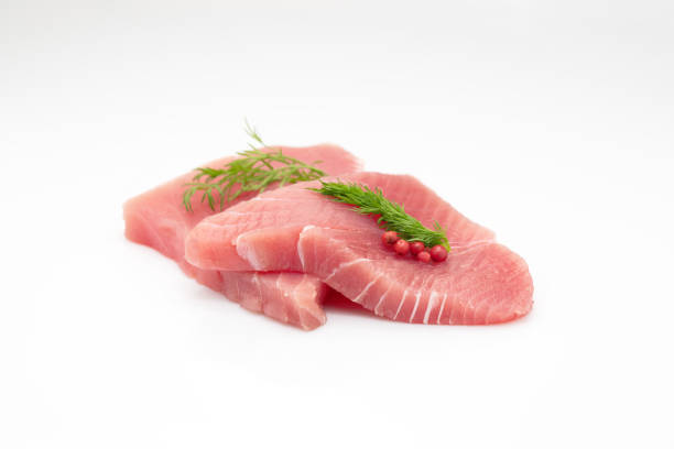 istock Tuna fillets with tomato 1299000575