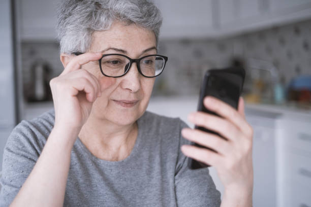 istock Senior Woman With Smartphone 1299002362