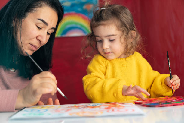 istock Mother And Preschooler Daughter Homeschooling 1299002380