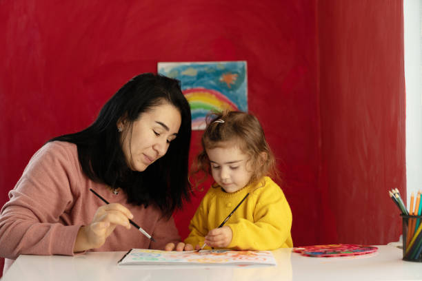 istock Mother And Preschooler Daughter Homeschooling 1299003694