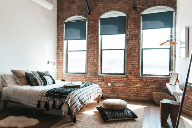 Cozy bedroom Bedroom of a cozy studio. carpet factory photos stock pictures, royalty-free photos & images