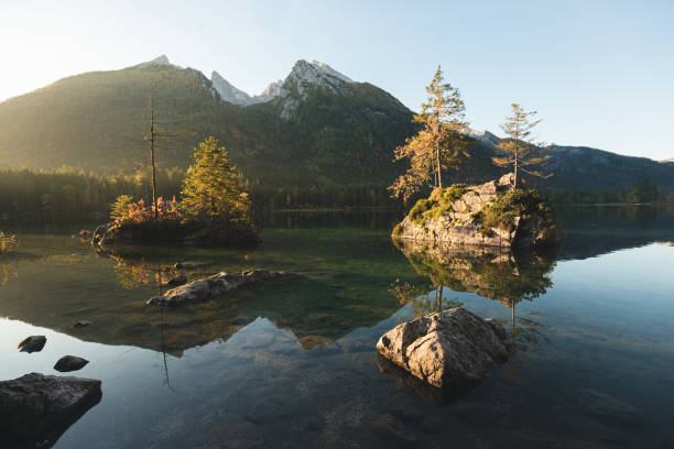 istock Sunrise at Lake Hintersee with mountain reflections 1299004778