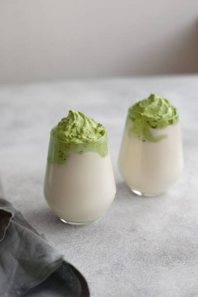 istock Homemade Dalgona matcha latte. A trendy drink from Korea. 1299006530