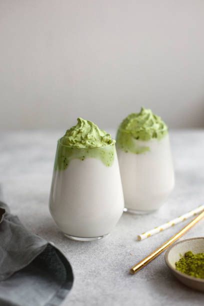 istock Homemade Dalgona matcha latte. A trendy drink from Korea. 1299006535