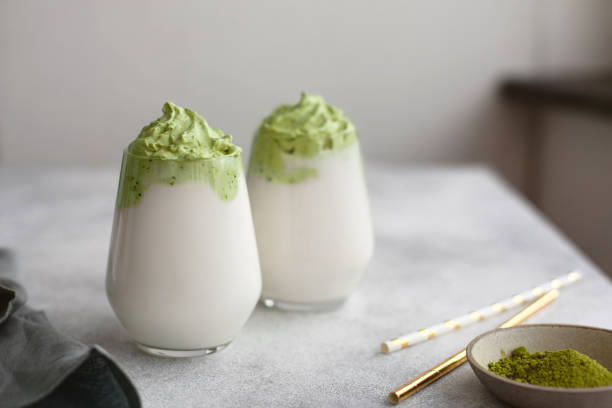 istock Homemade Dalgona matcha latte. A trendy drink from Korea. 1299006546