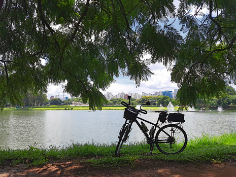 Bicycle parked in front of the Ibirapuera Park lake in the city of São Paulo