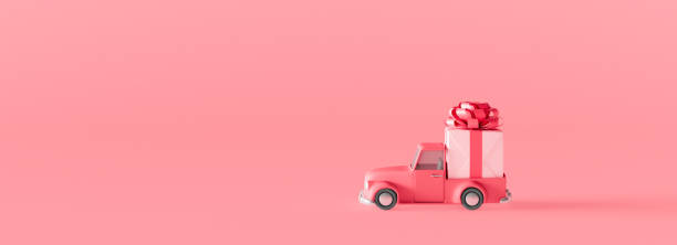 istock Cute Red Car Carrying Gift on pink background 3d render 1299007557