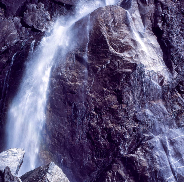Close-up of Yosemite Falls crashing on the boulders at the base of Yosemite Falls, along the adjacent trail.Taken in Yosemite National Park, California, USA.