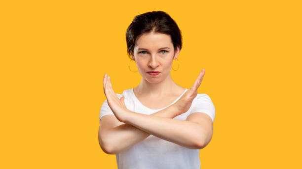 istock stop sign forbidden gesture angry woman hands 1299012054