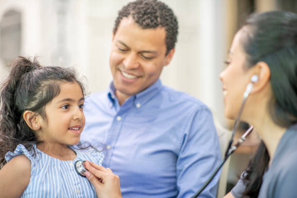 istock Young girl at a medical check up 1299017455