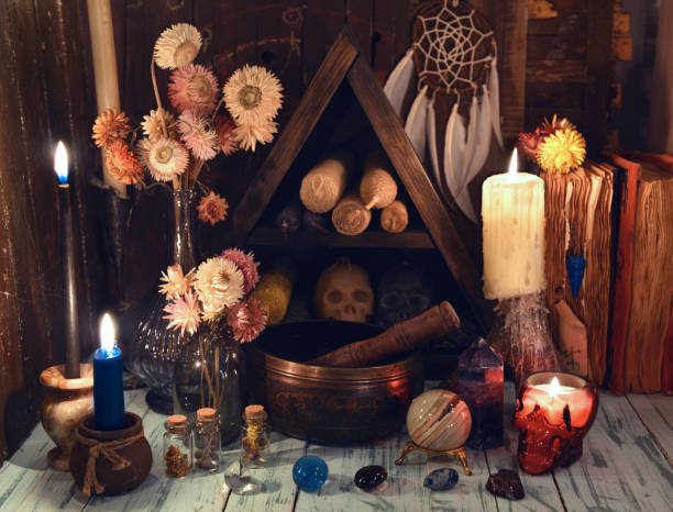 istock Burning candles, Tibetan singing bowl and crystals on the witch table. 1299029134