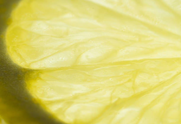istock Lemon slice macro detail close up 1299034842