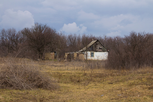 Old abandoned house on the outskirts of the village