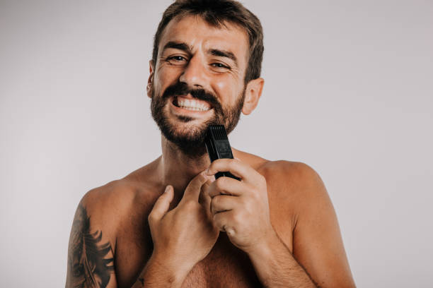 istock Male is about to cut he’s beard off 1299037201