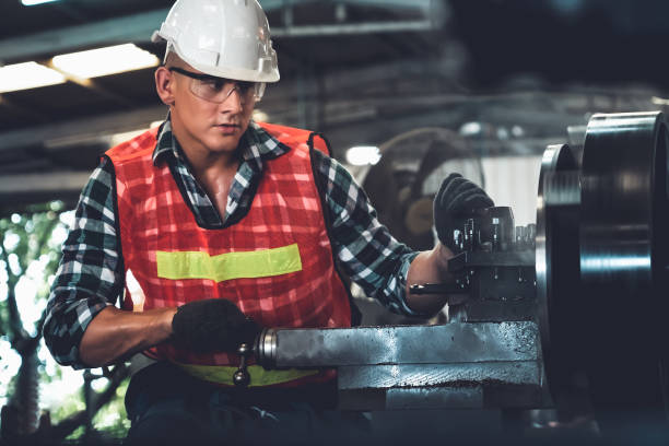 istock Smart factory worker or engineer do machine job in a manufacturing workshop 1299037203