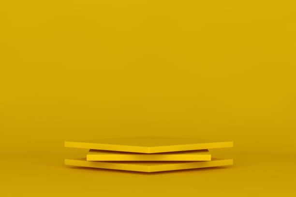istock Yellow podium and minimal abstract background, 3d rendering geometric shape, Stage for awards on website in modern. 1299038867