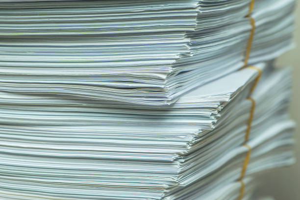 istock pile of paper documents in the office 1299040510