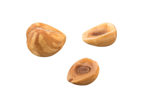 istock Hazelnuts full and splited isolated on white background 1299040659