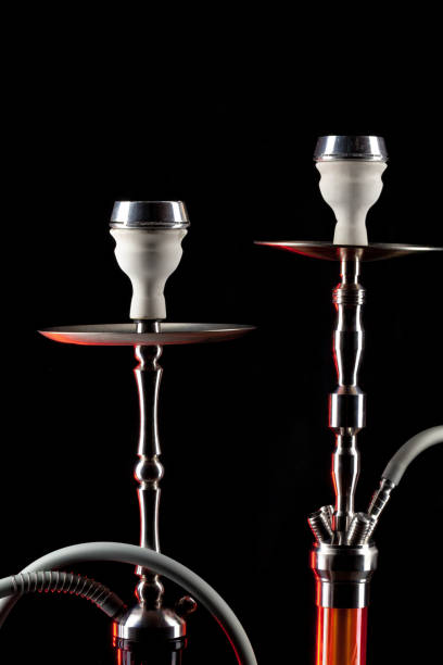 istock Ceramic tobacco bowl of hookah on black background 1299042331