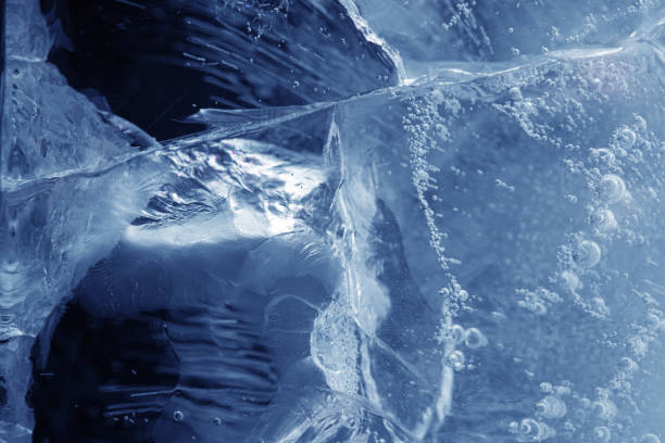 istock beautiful blue ice with cracks. frosty background 1299048013