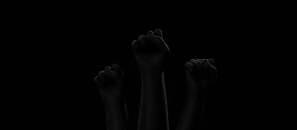 Photo of Black fists on black background with rim. protests. Blackout. Social justice concept. 3D render.