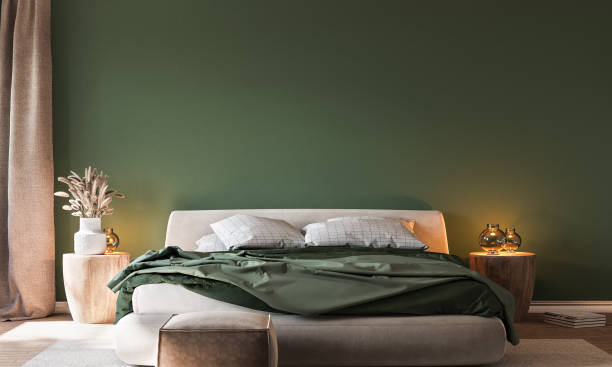 sfondo interno della casa, accogliente camera da letto verde con mobili luminosi tavoli in legno naturale - headboard foto e immagini stock