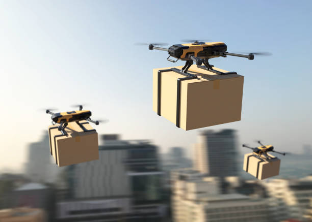 drone consegna pacco in città. trasporto aereo d'affari. concetto di robot aeronautico senza equipaggio. trasporto aereo veloce - helicopter air vehicle business cargo container foto e immagini stock