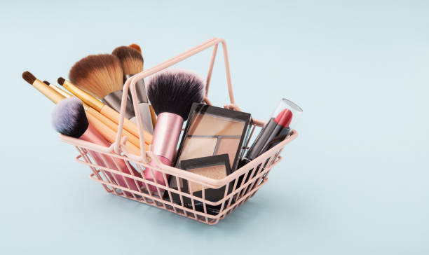 istock Makeup beauty products in pastel pink shopping basket 1299052847