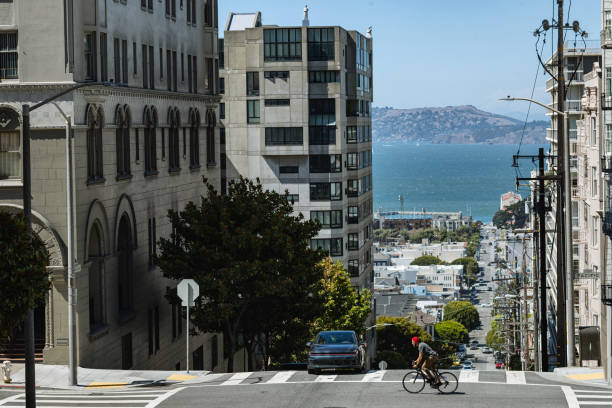 istock Bicycle riding in San Francisco: commuter with racing bicycle 1299059490