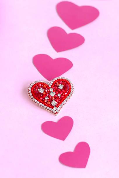 istock Red heart made of beads. Pink hearts. 1299059990