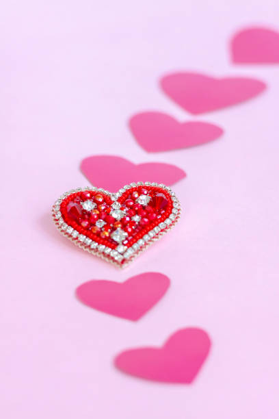 istock Red heart made of beads. Pink hearts. 1299059995