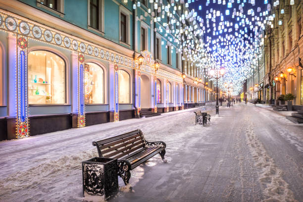 istock Glowing lanterns from the sky in Stoleshnikov Lane in Moscow 1299064011