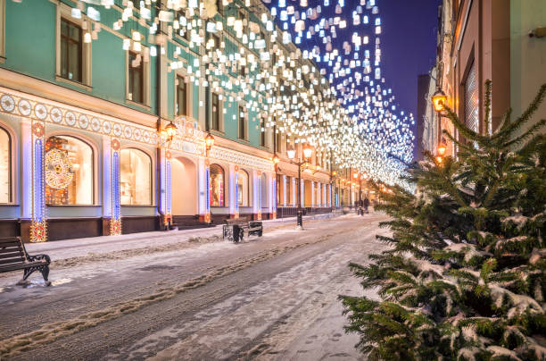 istock Glowing lanterns from the sky in Stoleshnikov Lane in Moscow 1299064110