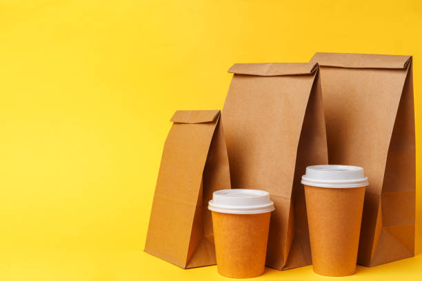 istock Takeaway food concept. Some packed food in container with coffee cup 1299064995