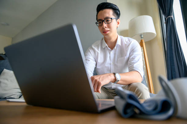 istock Young man consulting with his doctor over video call 1299065256