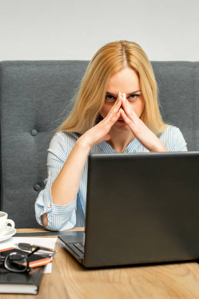 istock Business woman tired from work 1299066609
