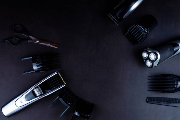 istock hair clipper black background. 1299066956