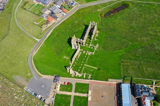 Aerial photo of the beautiful town of Whitby in the UK in North Yorkshire in the UK showing the remains of the historic Whitby Abbey